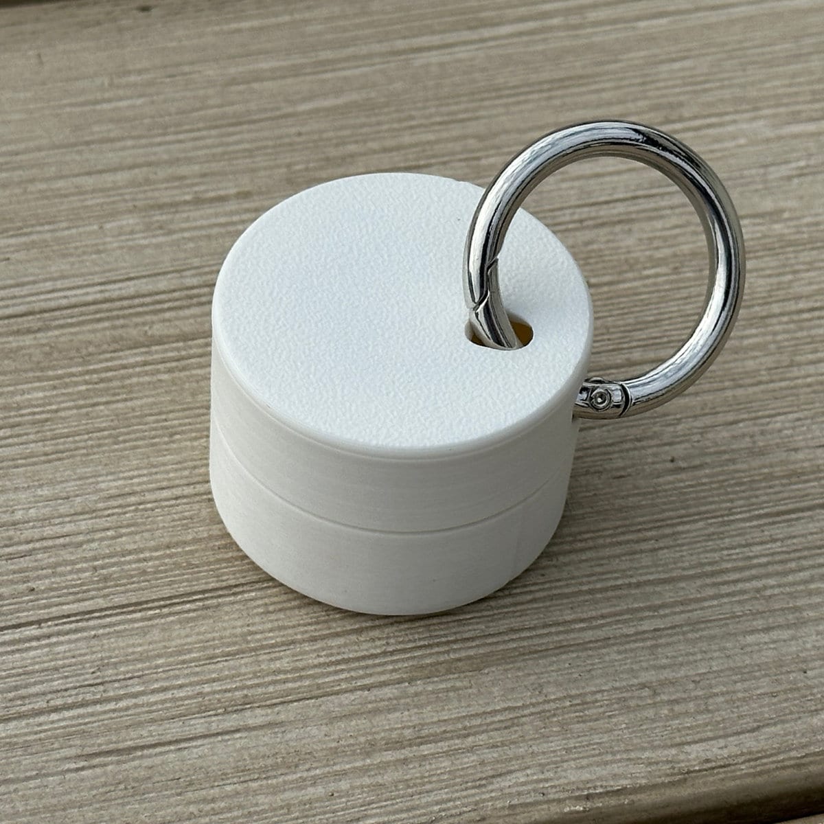 White apple airtag ring holder